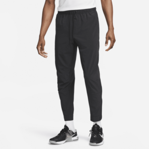 Alsidige, figursyede Nike Dri-FIT Unlimited-bukser til mænd - sort