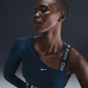 Asymmetrisk Nike Pro Shine Dri-FIT-croptop til kvinder - blå