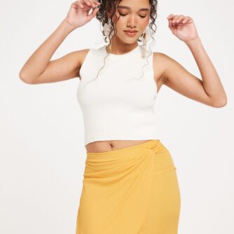 Nelly - Orange - knot side mini skirt