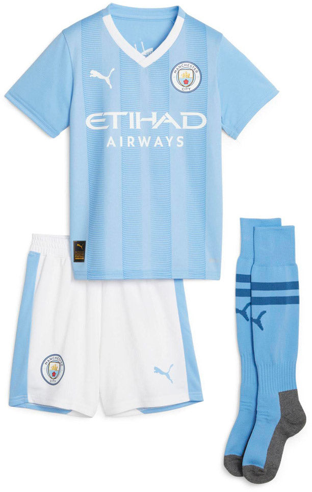 Puma Manchester City 23/24 Mini Hjemmebanesæt Unisex 104 Blå Puma Manchester City 23/24 Mini Hjemmebanesæt Unisex 104 Blå