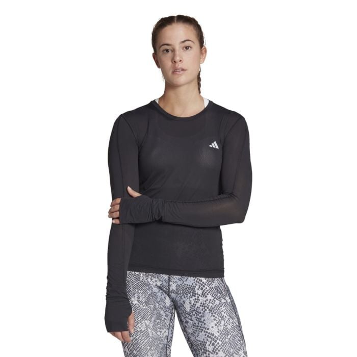 adidas Fast Long Sleeve Trøje til Dame - Optimal komfort og stil til løbetræning adidas Fast Long Sleeve Trøje til Dame - Optimal komfort og stil til løbetræning