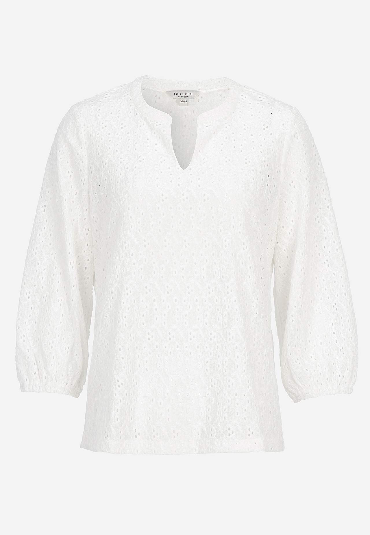 Jerseytop med broderet hulmønster Jerseytop med broderet hulmønster